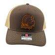A Richardson 112 trucker hat in brown and dark khaki mesh, featuring a brown leather patch with a turkey design and the text 'LIMITS' on the front. The Richardson brand sticker is visible on the brim.